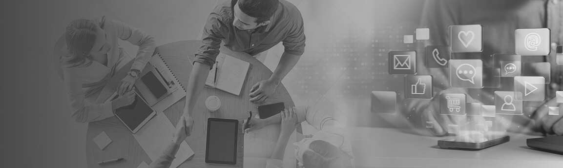 Social Media icons over a phone next to a table of workers